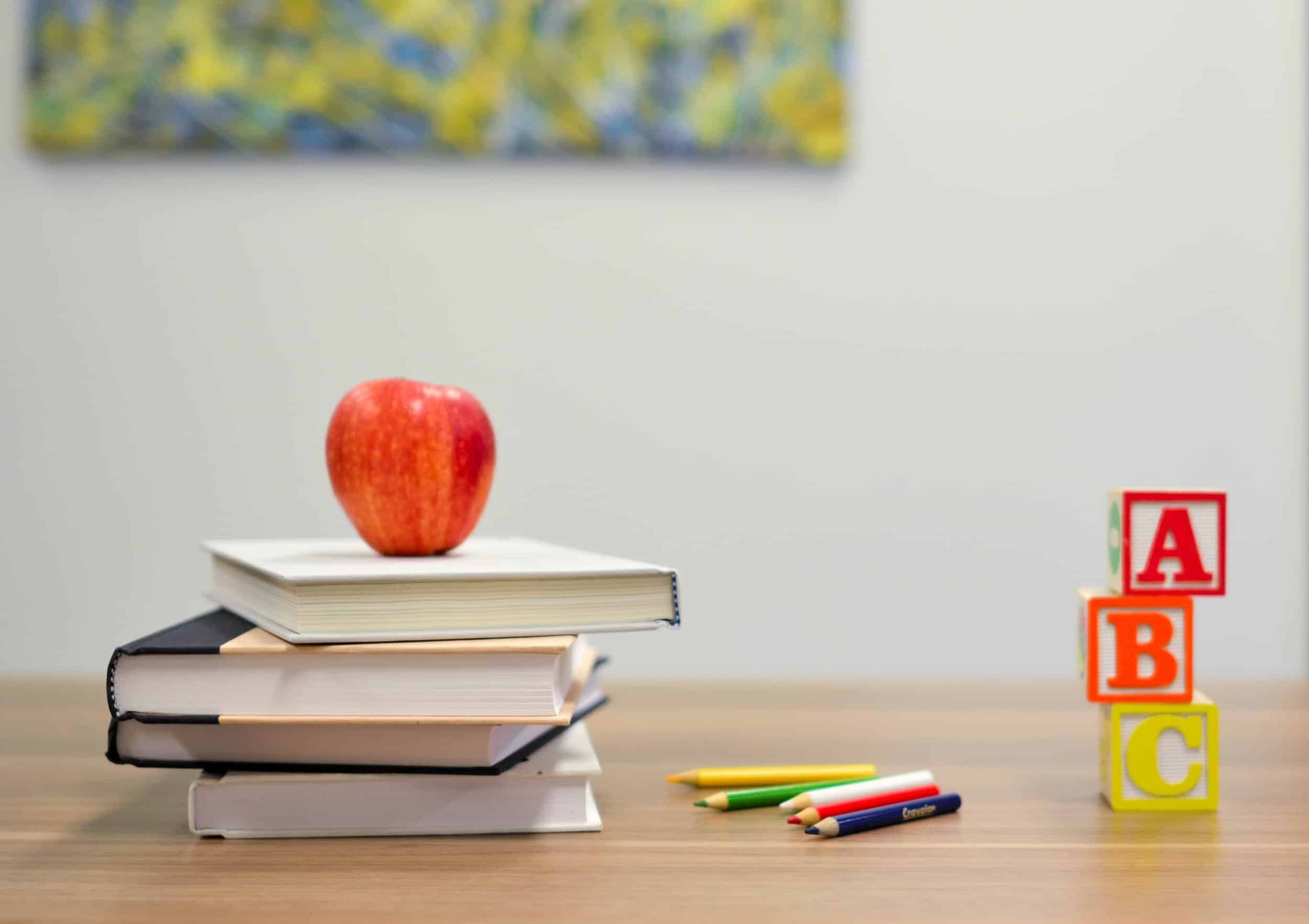 apple a day school books and pencils