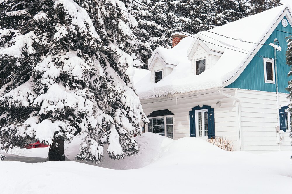 Snow exterior photo of a home