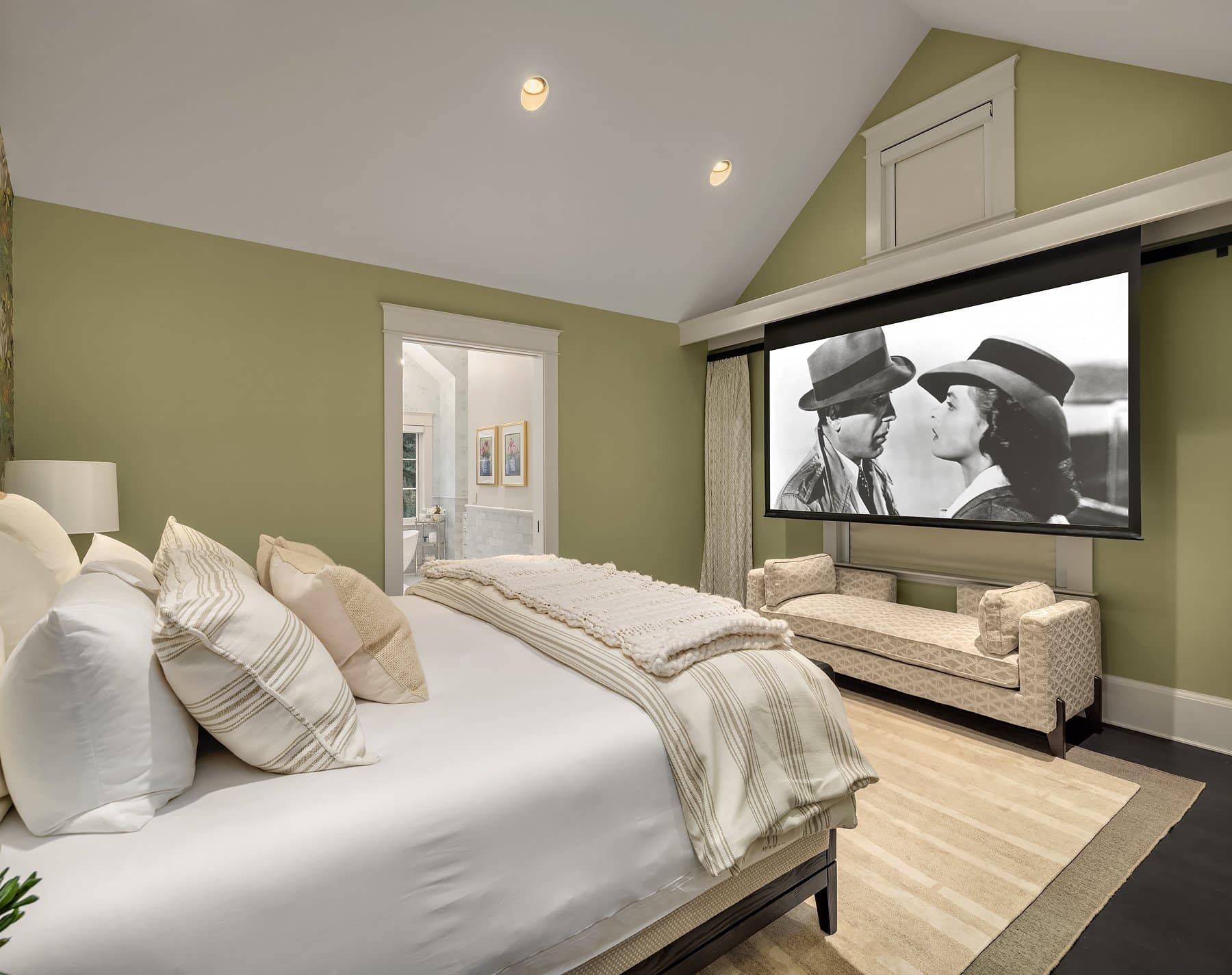 luxury snohomish home staging - primary bedroom with projector and hidden speakers