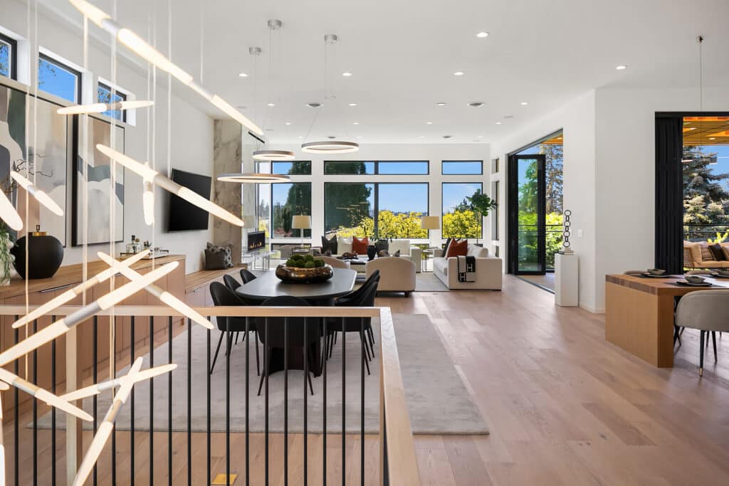 Modern open-plan living and dining area with large windows.