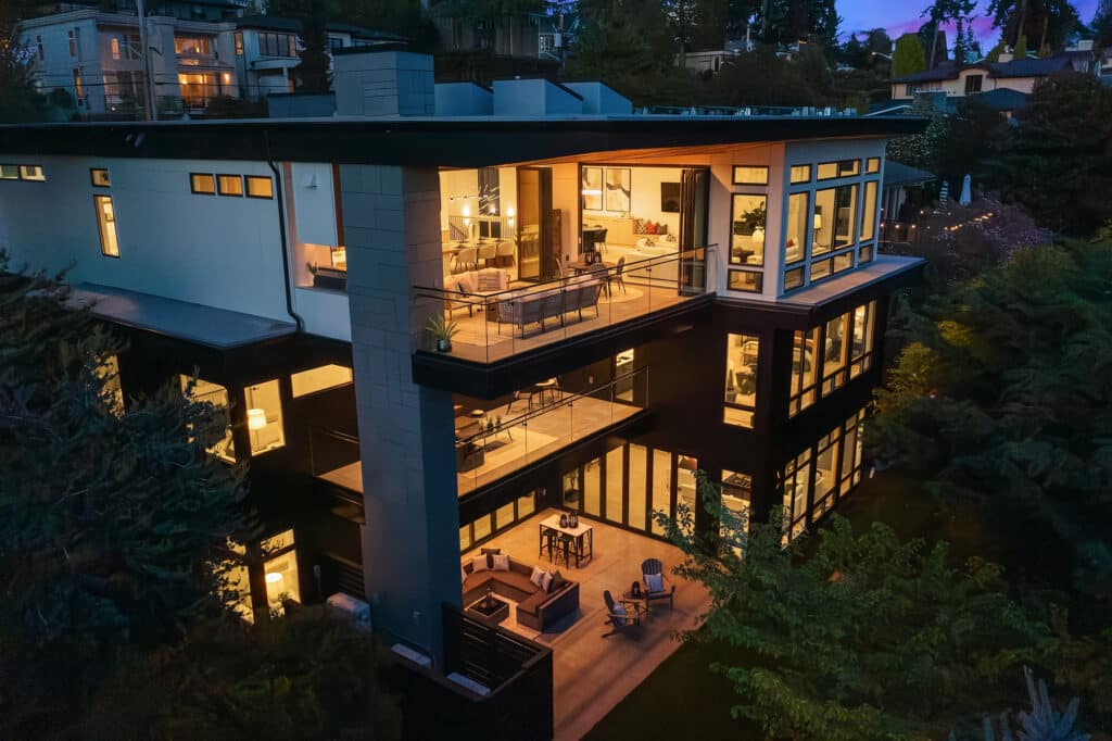 Modern three-story house at night